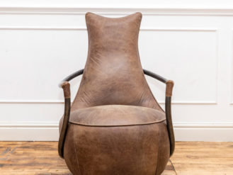 See this Maverick Retro Relax Chair in your home? The piece carries its exudes a retro laid back design and comes upholstered in classic brown leather.